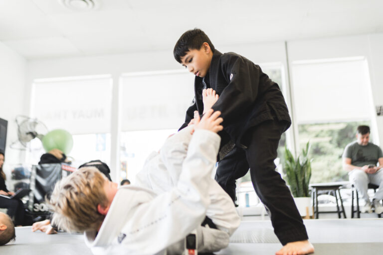 Boys training jiu jitsu